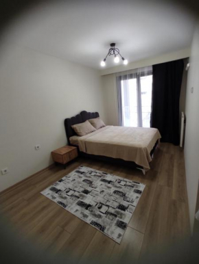 Luxurious 2 bedroom flat with pool and garden.
